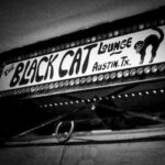 The sign at the Black Cat Lounge